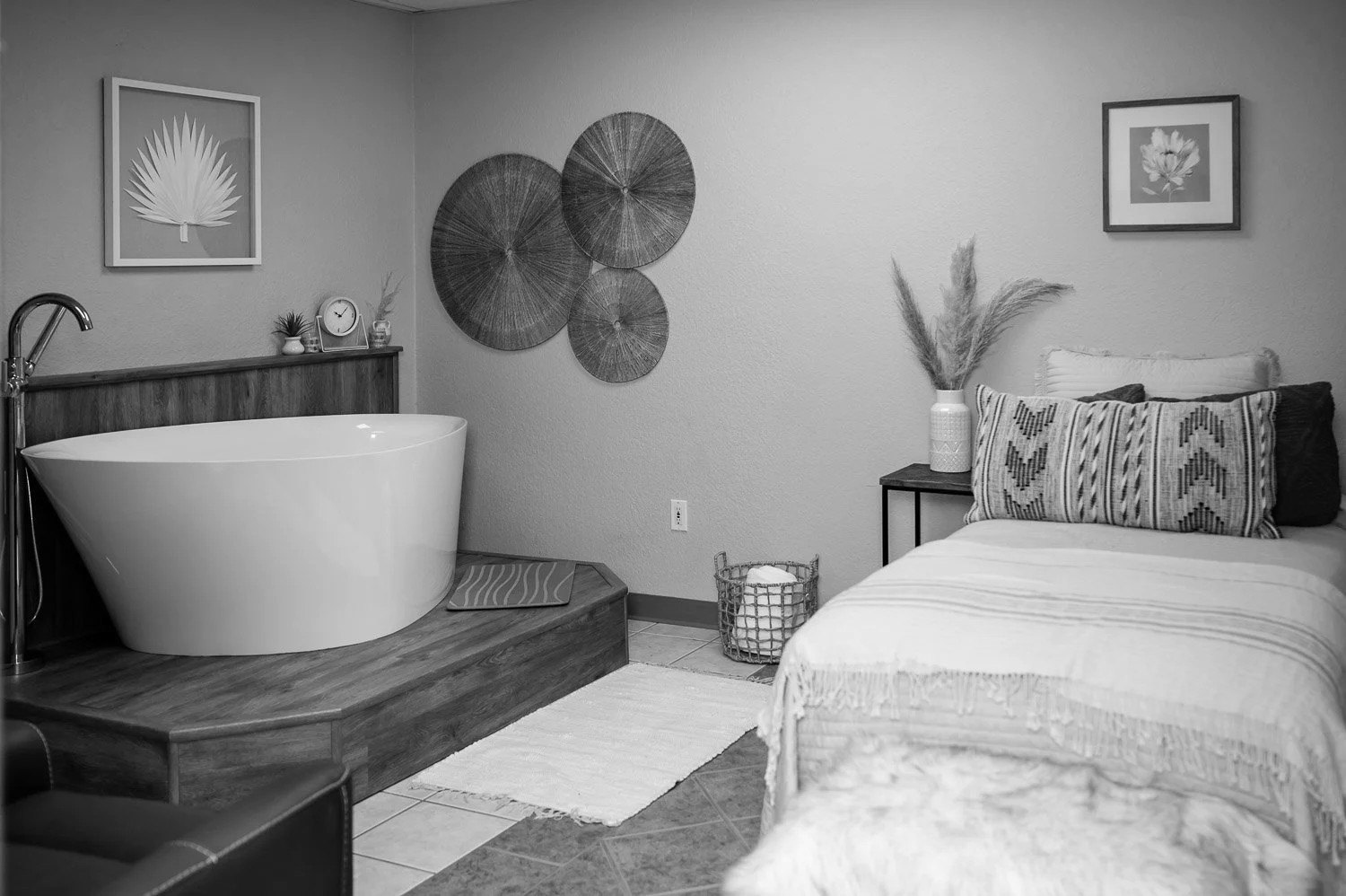 Private birth suite with soaking tub and bed at Joyful Beginnings Birth Center in New Braunfels, TX